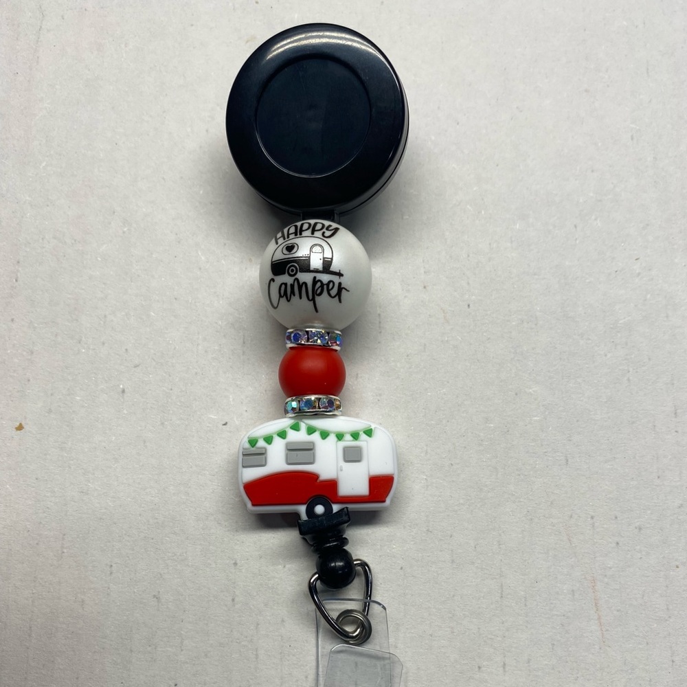 NWT HAPPY CAMPER BADGE REEL